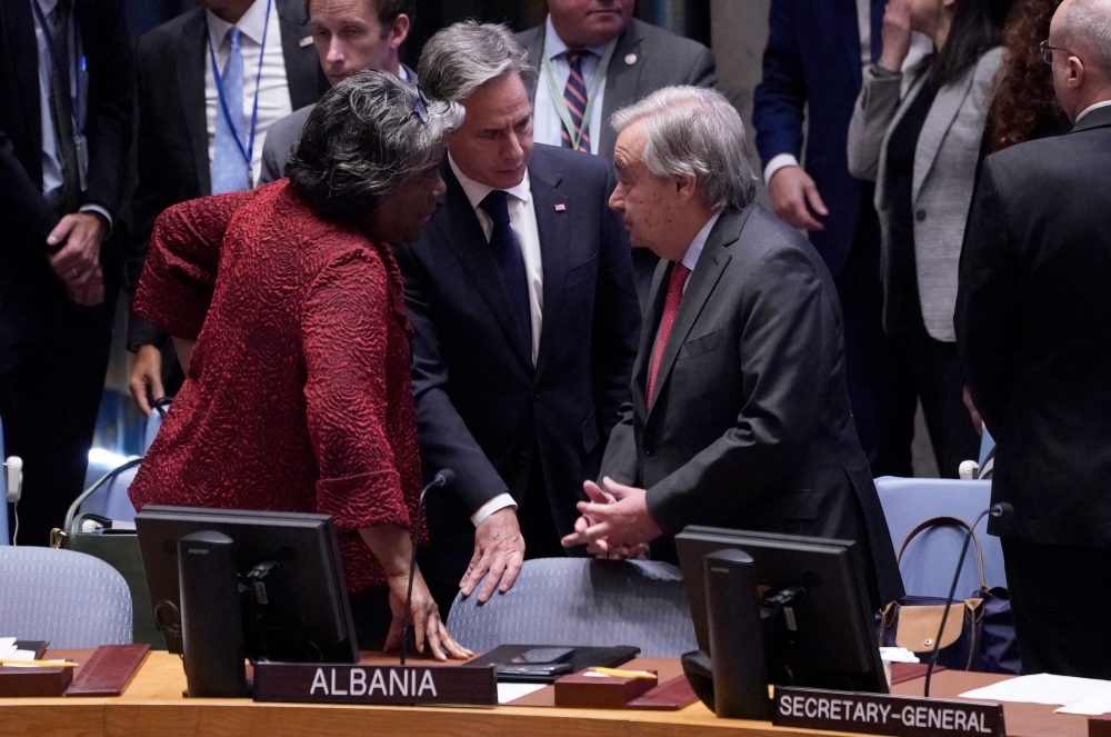 UN Secretary General Antonio Guterres (right) speaks with US Secretary of State Antony Blinken (centre) and US Ambassador to the UN Linda Thomas-Greenfield before the start of a United Nations (UN) Security Council meeting on the conflict in Middle East at the UN headquarters in New York City on October 24, 2023. (Photo by Timothy A Clary / AFP)