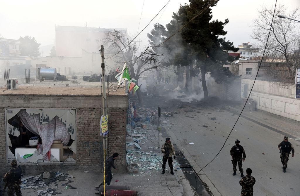 Afghan security personnel arrive at the site of an explosion in Kabul on March 13, 2017. AFP / WAKIL KOHSAR

