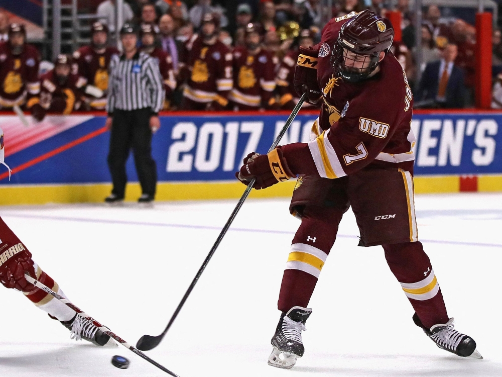 (Files) Adam Johnson #7 of the Minnesota-Duluth Bulldogs fires in a shot during the 2017 NCAA Division I men's Ice Hockey Championship game at the United Center in Chicago, Illinois, on April 8, 2017. (Photo by Jonathan Daniel / AFP)