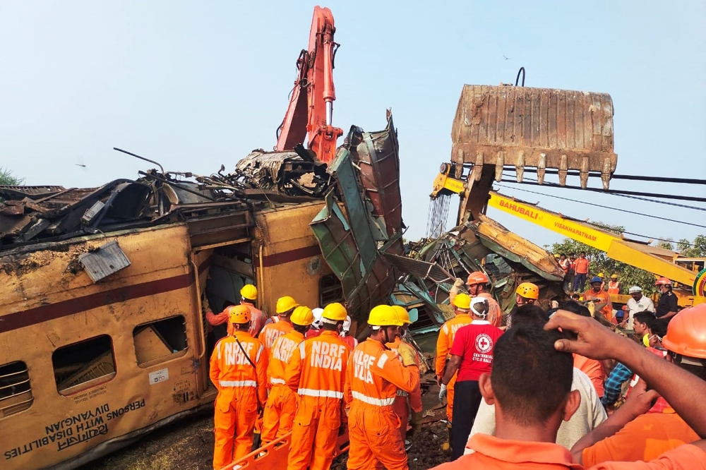 Members of the National Disaster Response Force (NDRF) conduct rescue operation at the site of train crash in Vizianagaram district of India's Andhra Pradesh state on October 30, 2023. Photo by AFP