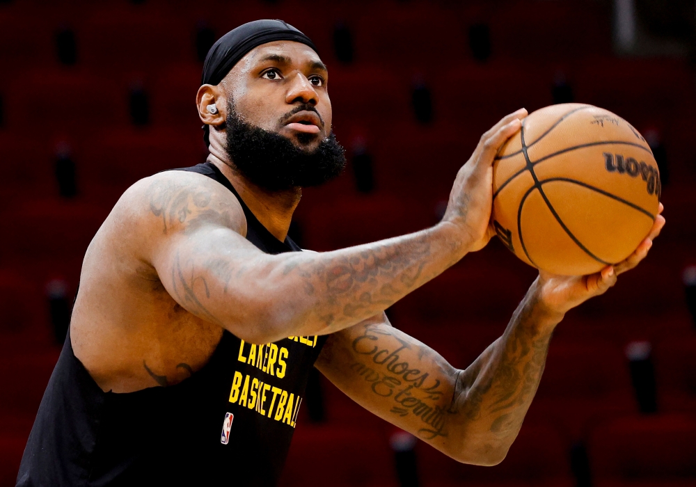 File: LeBron James #23 of the Los Angeles Lakers warms up prior to facing the Houston Rockets at Toyota Center on November 08, 2023 in Houston, Texas. (Photo by Carmen Mandato / Getty Images / AFP)
