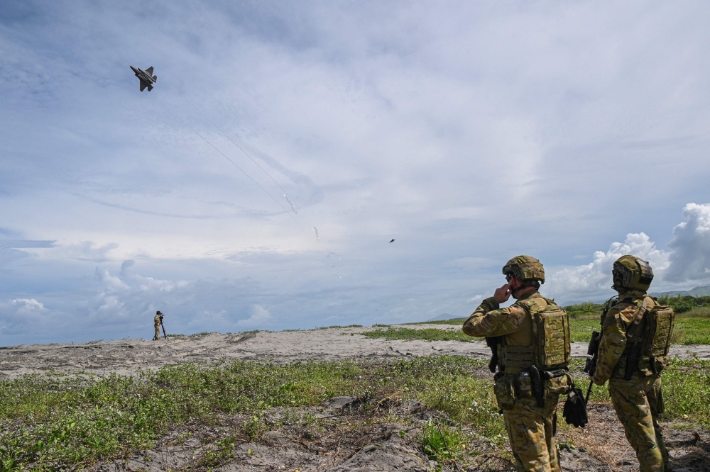 An Australian F-35A lightning fighter jets fly past during a joint exercise between Australian and Philippine troops at a naval base in San Antonio town, Zambales province on August 25, 2023. Photo by Ted ALJIBE / AFP