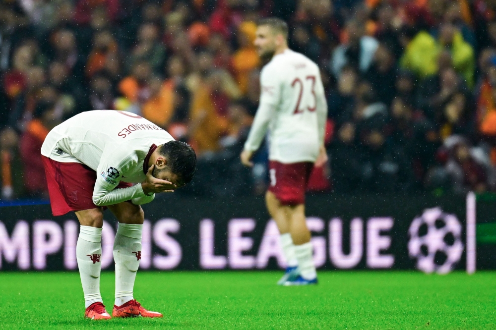 Manchester United's Portuguese midfielder #08 Bruno Fernandes reacts at the end of the UEFA Champions League 1st round, day 5, Group A football match between Galatasaray and Manchester United at Ali Sami Yen Spor Kompleksi in Istanbul, on November 29, 2023. (Photo by Yasin Akgul / AFP)