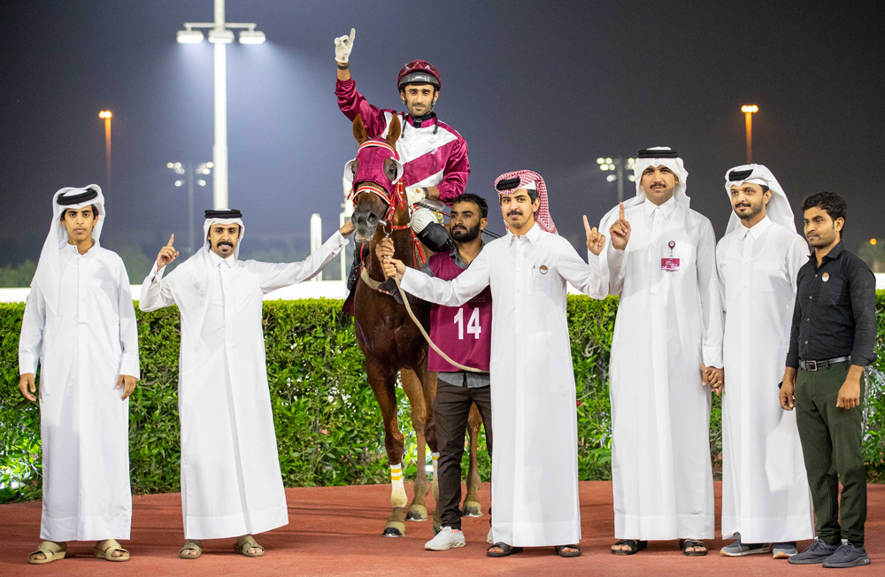Suheal Qatar's connections celebrate after winning the Bu Samrah Cup.