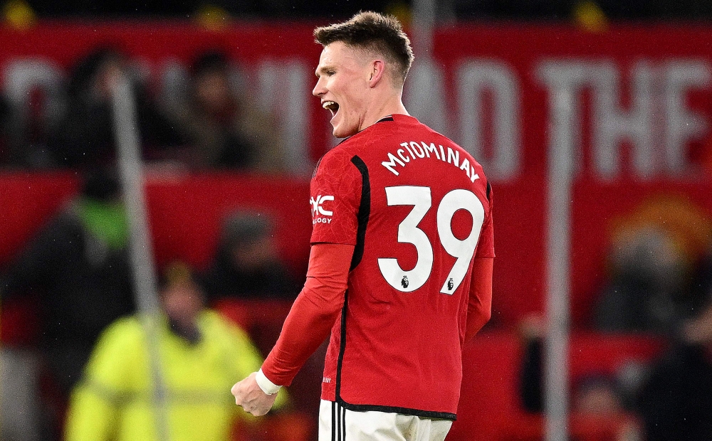 Manchester United's Scottish midfielder #39 Scott McTominay celebrates scoring the team's second goal during the English Premier League football match between Manchester United and Chelsea at Old Trafford in Manchester, north west England, on December 6, 2023. Photo by Oli SCARFF / AFP