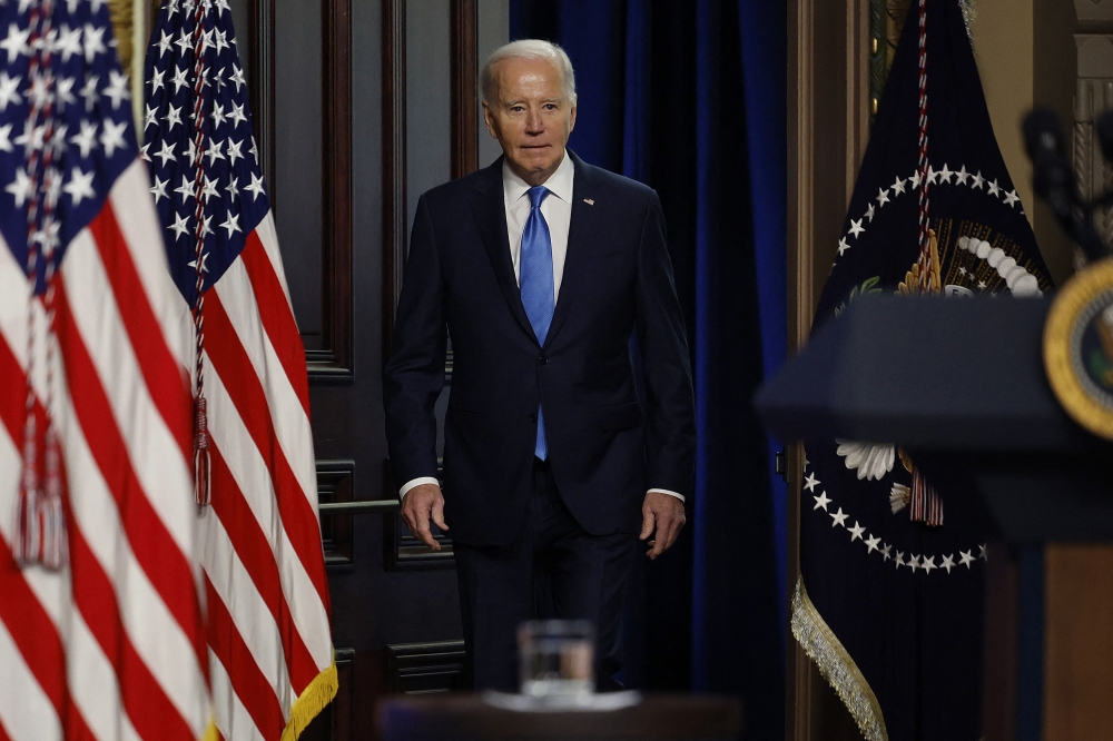 US President Joe Biden arrives for a meeting of his National Infrastructure Advisory Council in the Indian Treaty Room of the Eisenhower Executive Office Building on December 13, 2023 in Washington, DC. Chip Somodevilla/Getty Images/AFP 