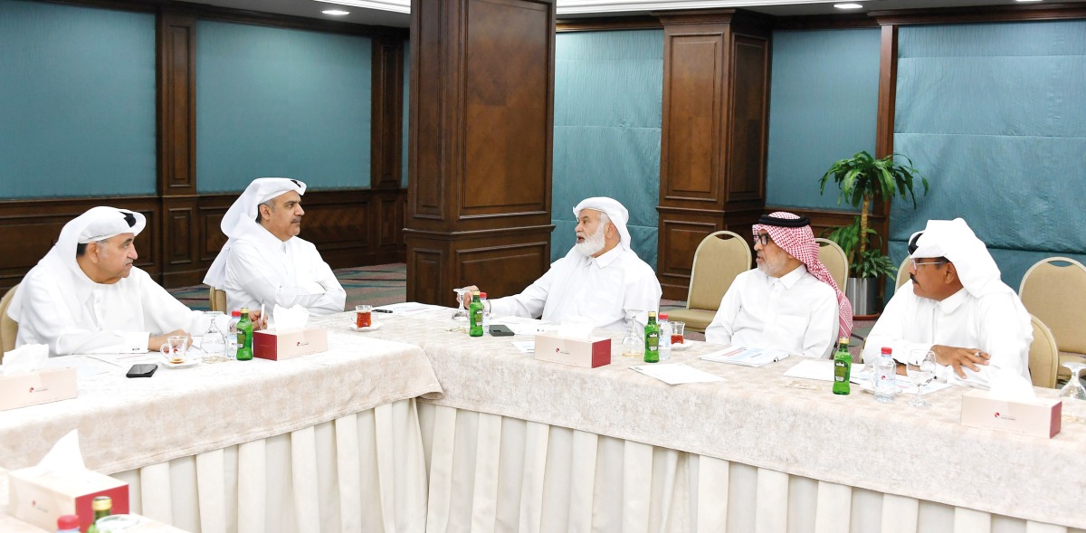 Qatar Chamber Real Estate Committee Chairman Abdulrahman bin Abduljaleel Al Abdulghani and other officials during the meeting. 