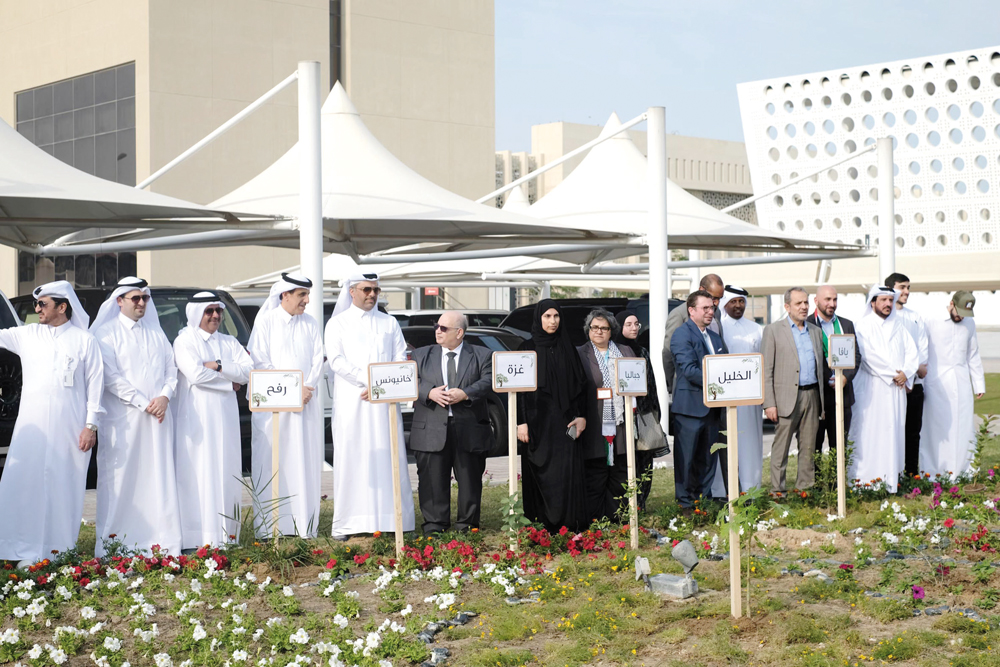 Vice-President for Student Affairs Dr. Eiman Mustafawi and other officials at the plantation event. 