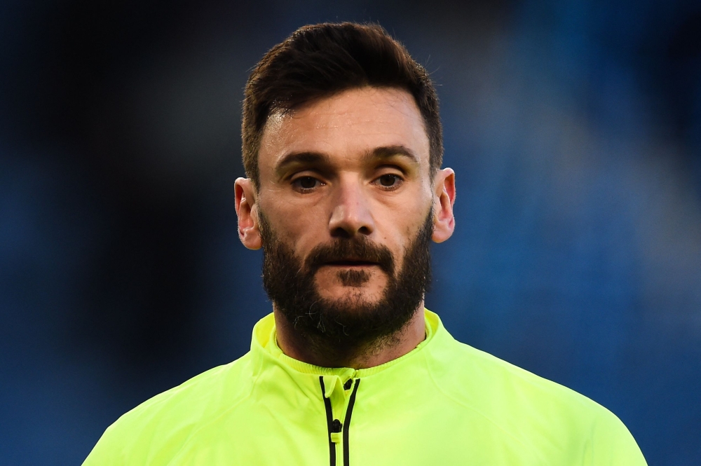 Tottenham Hotspur's French goalkeeper Hugo Lloris reacts as he warms up prior to the English Premier League football match on April 3, 2023. (Photo by Peter Powell / AFP)