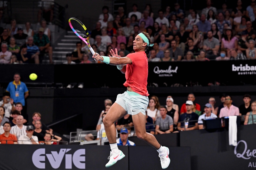 Spain's Rafael Nadal hits a return during his men's singles match against Jason Kubler of Australia at the Brisbane International tennis tournament in Brisbane on January 4, 2024. Photo by William WEST / AFP