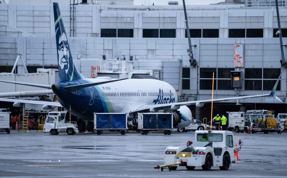 An Alaska Airlines Boeing 737 MAX 9 plane sits at a gate at Seattle-Tacoma International Airport on January 6, 2024 in Seattle, Washington. Stephen Brashear/Getty Images/AFP 
