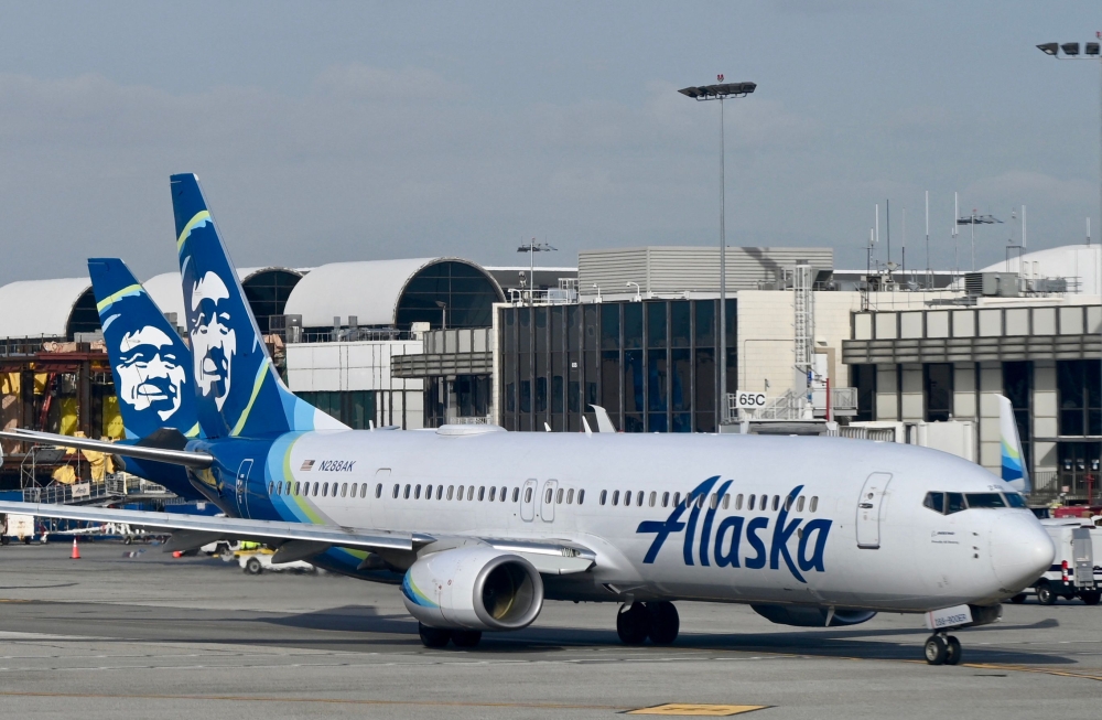 (Files) An Alaska airlines plane seen at Los Angeles International Airport (LAX) on January 11, 2023. (Photo by Daniel Slim / AFP)