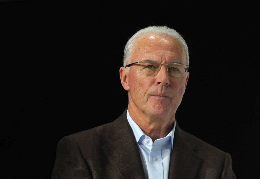 (FILES) German soccer legendFranz Beckenbauer follows the FIFA Soccer World Cup 2010 award ceremony at the headquarters of German sportswear maker Adidas in Herzogenaurach, southern Germany, on December 14, 2010. (Photo by Christof STACHE / AFP)
