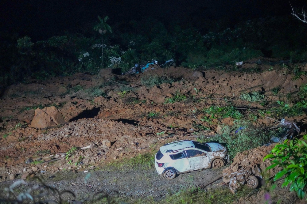 Handout picture released by the Government of Choco press office showing the area of a landslide in the road between Quibdo and Medellin, Choco Department, Colombia, on January 12, 2024. (Photo by Handout / GOBERNACION DE CHOCO / AFP) 