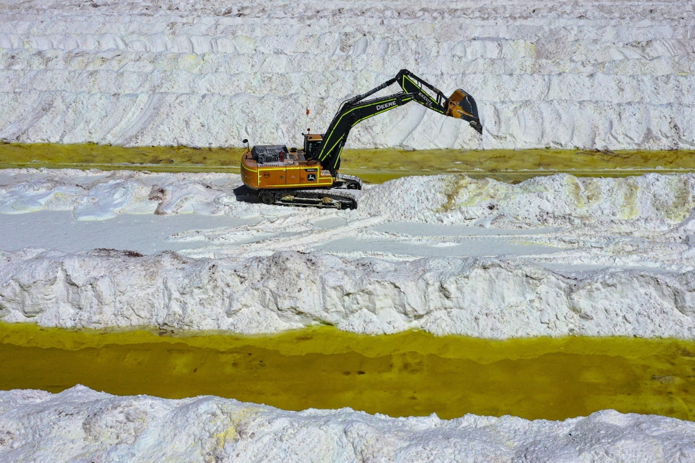 Aerial view of brine ponds and processing areas of the lithium mine of the Chilean company SQM (Sociedad Quimica Minera) in the Atacama Desert, Calama, Chile, on September 12, 2022. Photo by Martin BERNETTI / AFP