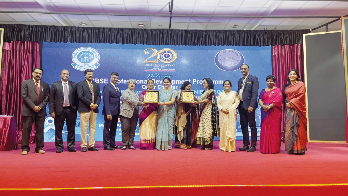 School principals, teachers and officials with the guest speakers. 