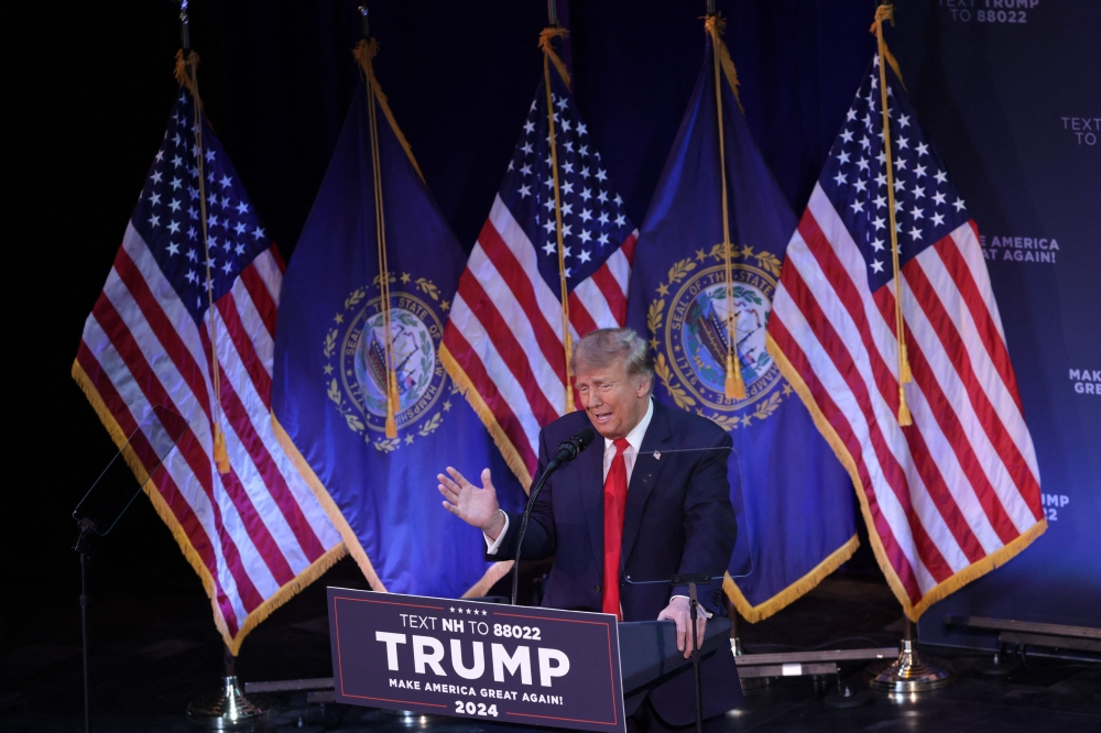 Republican presidential candidate and former President Donald Trump addresses a campaign rally at the Rochester Opera House on January 21, 2024 in Rochester, New Hampshire. (Photo by ALEX WONG / GETTY IMAGES NORTH AMERICA / Getty Images via AFP)
