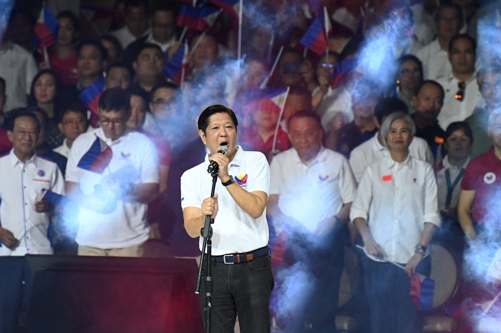 Philippine President Ferdinand Marcos Jr delivers a speech during the kick-off rally for the New Philippines movement at Quirino Grandstand in Manila on January 28, 2024. (Photo by Jam Sta Rosa / AFP)