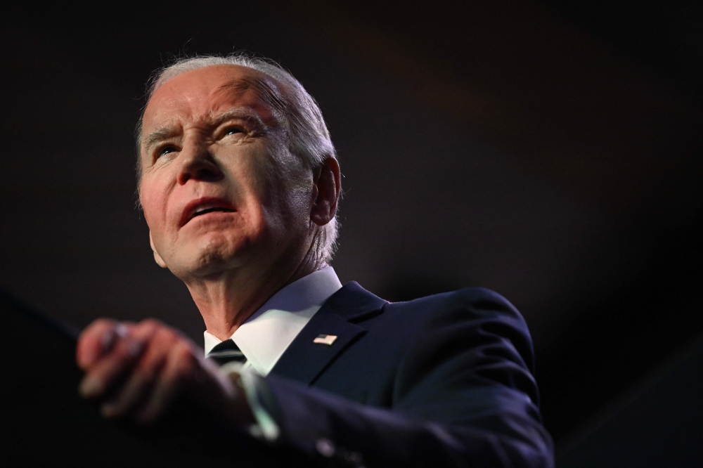US President Joe Biden speaks during the National Association of Counties Legislative Conference at the Washington Hilton, in Washington, DC, on February 12, 2024. (Photo by Jim WATSON / AFP)
