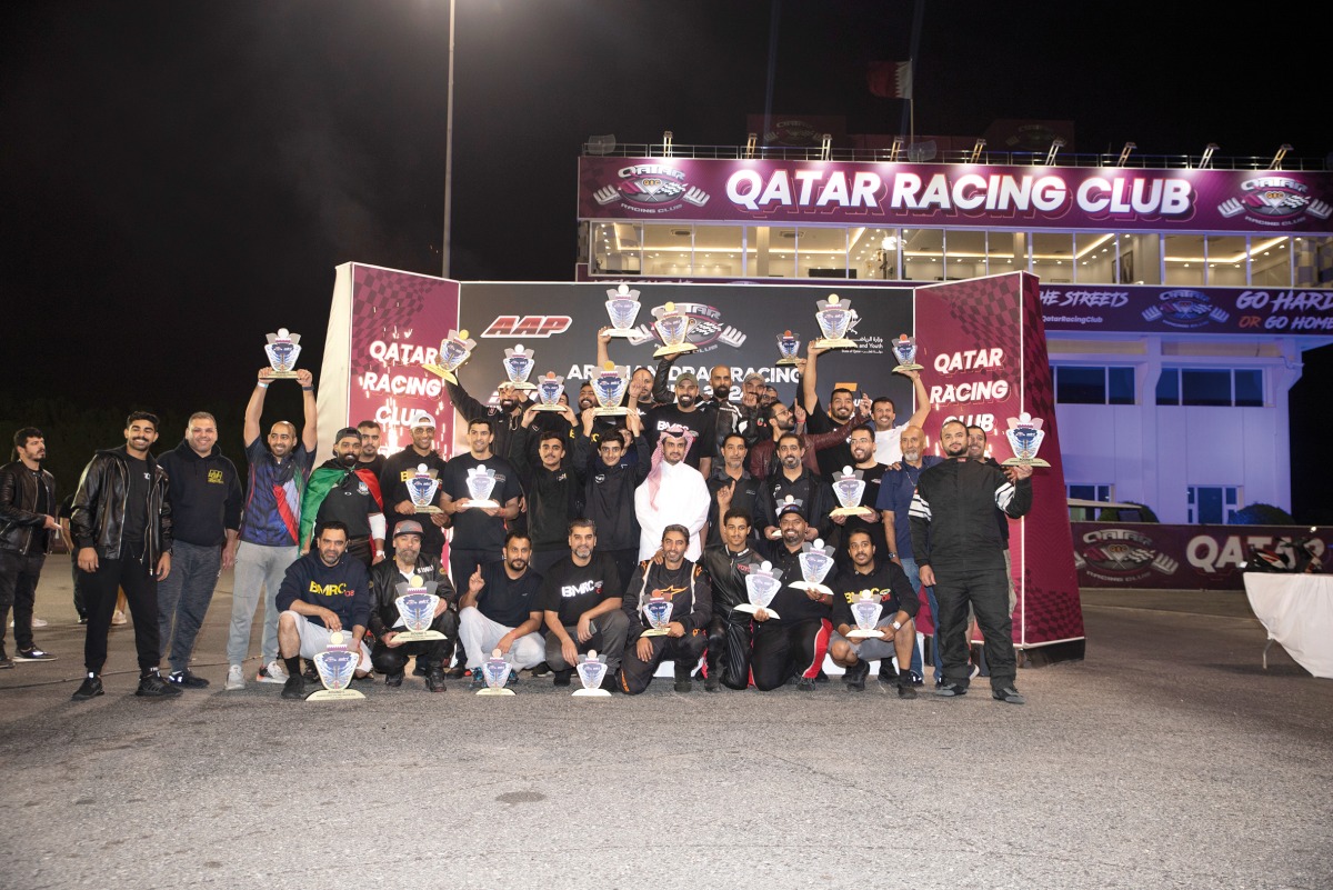 QRC Director Sheikh Jabor bin Khalid Al Thani poses with the podium winners of the 5th round of the Arabian Drag Racing League.