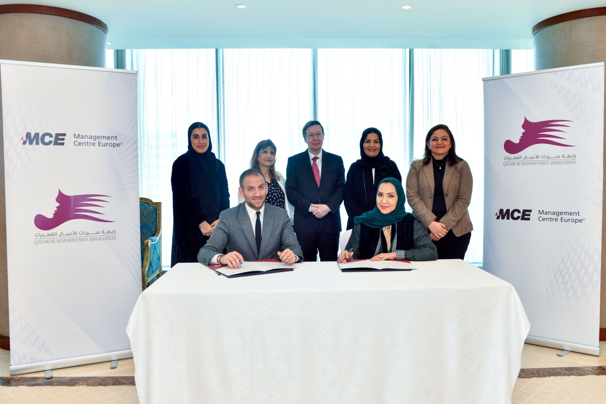 QBWA Board Member Amal Al Aathem; MCE Regional Key Account Manager Joseph Assaf at the agreement signing in presence of Ambassador of Belgium to Qatar H E William Asselborn and MCE head of Corporate Agreement ME Sobeie Isa.