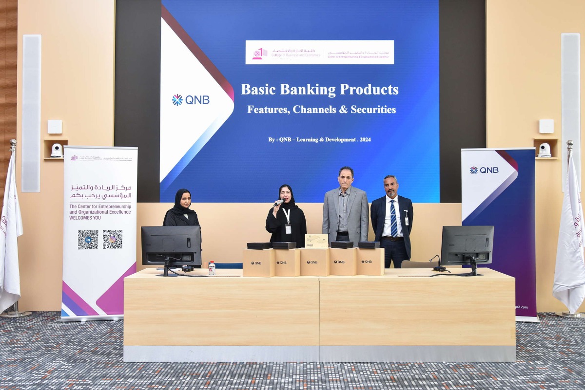 QNB and QU officials during the workshop hosted for the students.