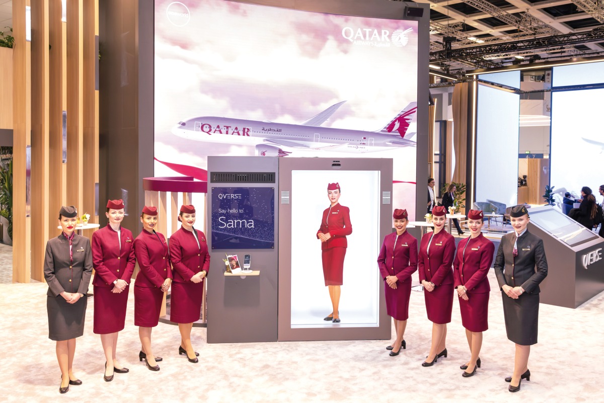 Qatar Airways cabin crew at the airline's booth during ITB Berlin 2024 in Berlin. 