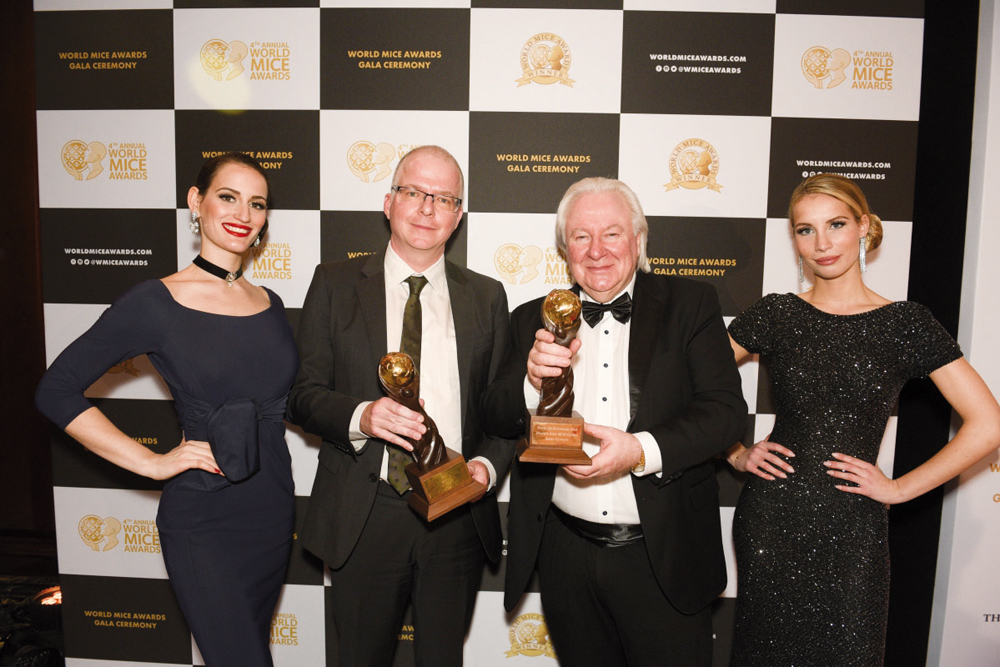 Qatar Airways officials with the awards at the World MICE Awards in Berlin.
