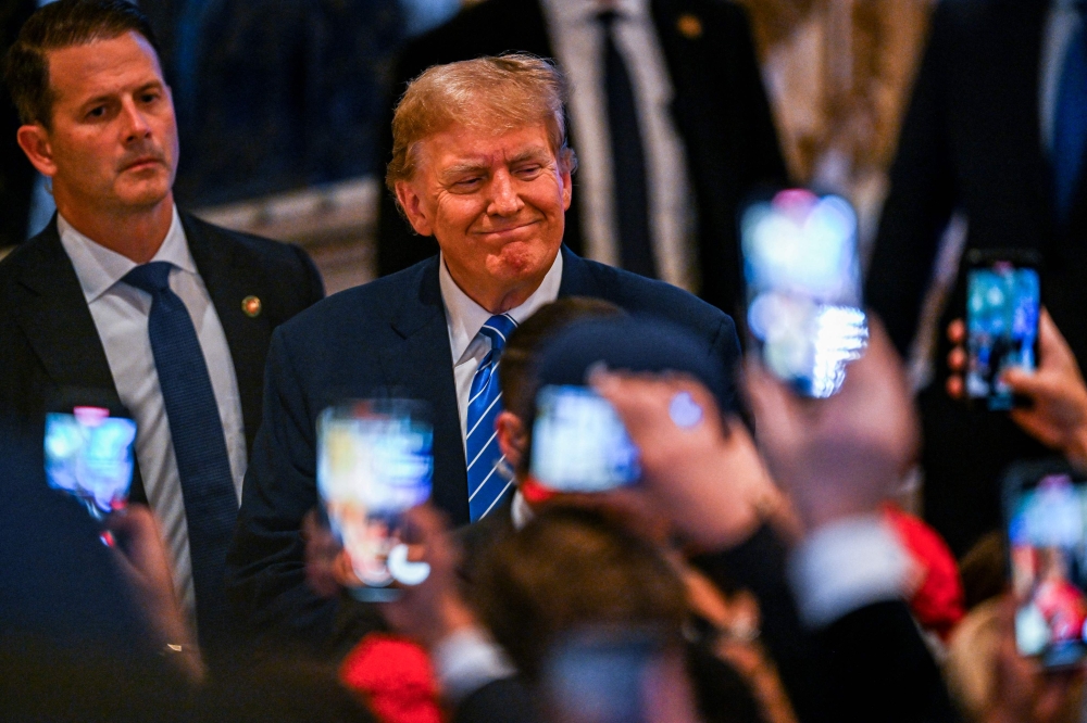 Former US President and 2024 presidential hopeful Donald Trump attends a Super Tuesday election night watch party at Mar-a-Lago Club in Palm Beach, Florida, on March 5, 2024. (Photo by CHANDAN KHANNA / AFP)
