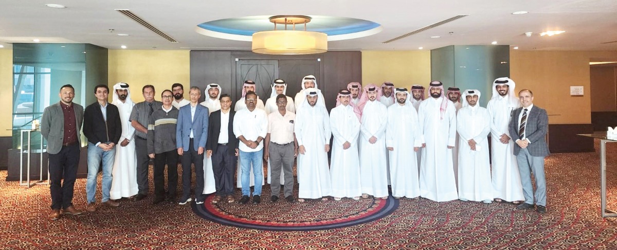 QU officials and government officials from Qatar, India and Nepal during the training workshop.