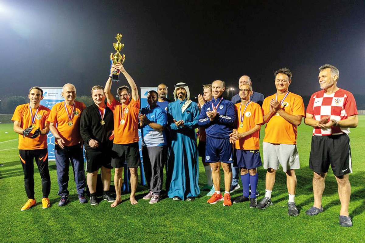 Ambassador of Finland to Qatar, H E Pekka Voutilainen, holds the trophy as Team Europe won the Ambassadors Tournament.