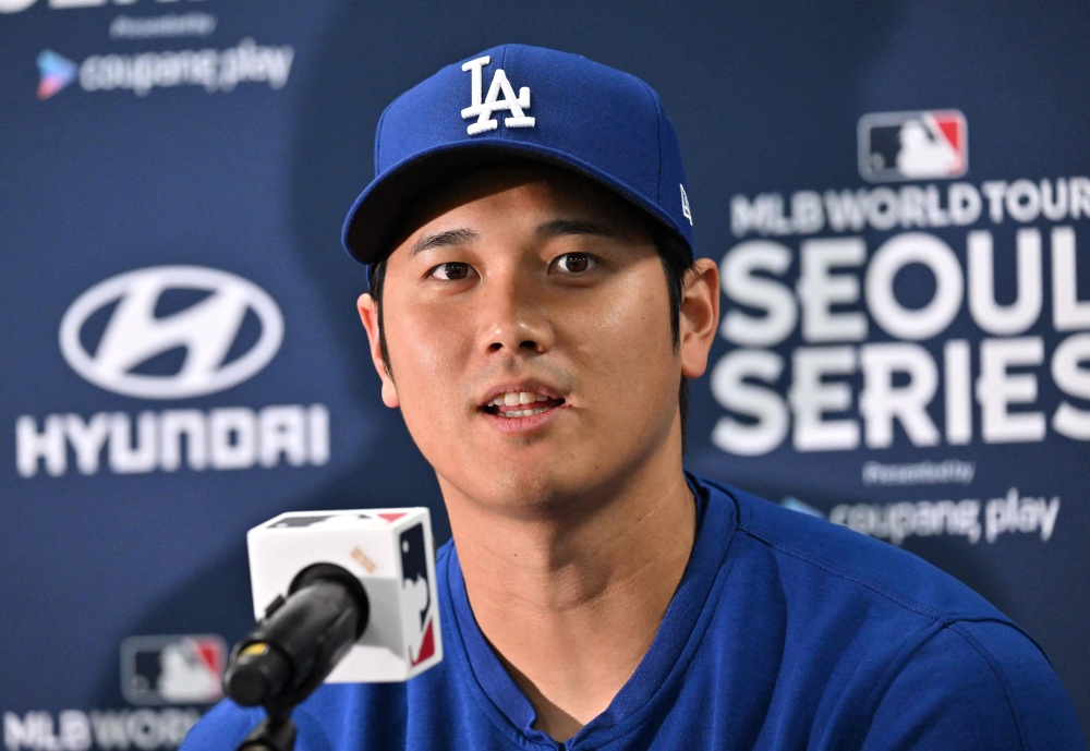 Los Angeles Dodgers' Shohei Ohtani speaks during a press conference prior to a baseball workout at Gocheok Sky Dome in Seoul on March 16, 2024, ahead of the 2024 MLB Seoul Series baseball game between Los Angeles Dodgers and San Diego Padres. (Photo by Jung Yeon-je / AFP)