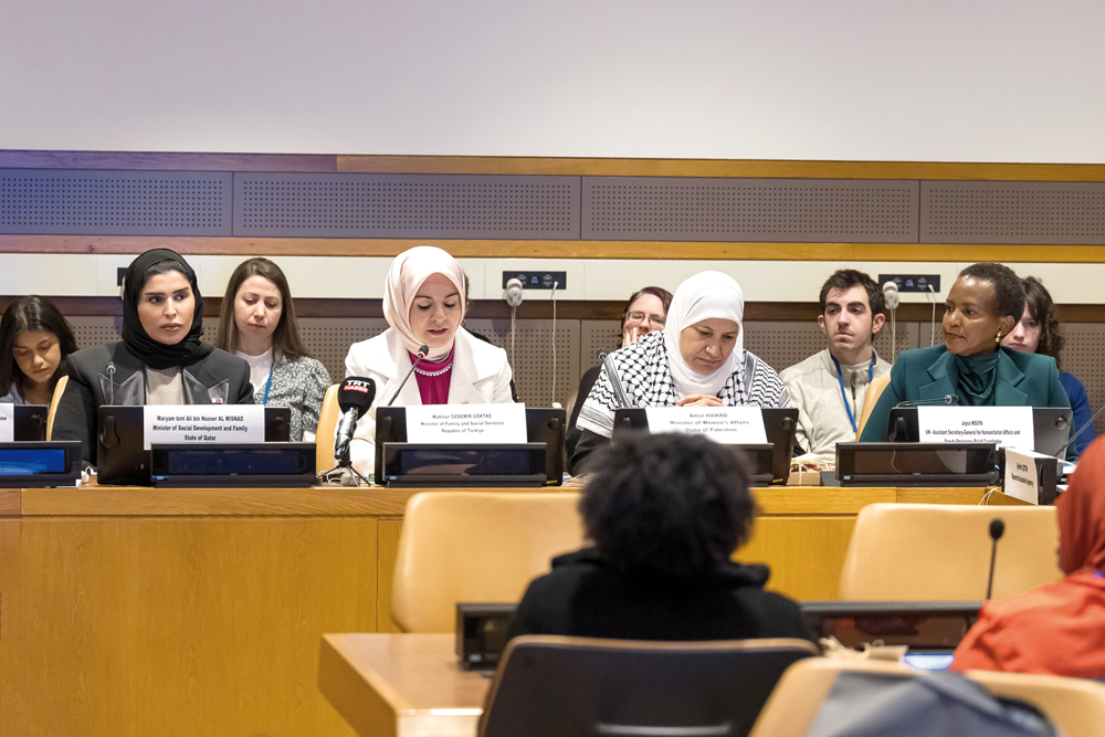Minister of Social Development and Family H E Maryam bint Ali bin Nasser Al Misnad (front left) and other delegates at the event.