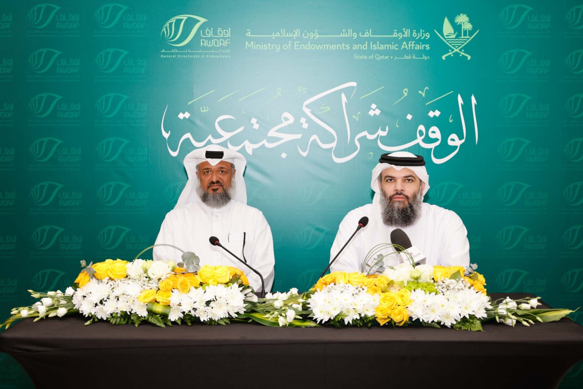Director of General Directorate of Endowments Dr. Sheikh Khalid bin Mohammed Al Thani (right) with Vice President of Qatar Autism Society Saad Mohammed Al Ghanem during a press conference.
