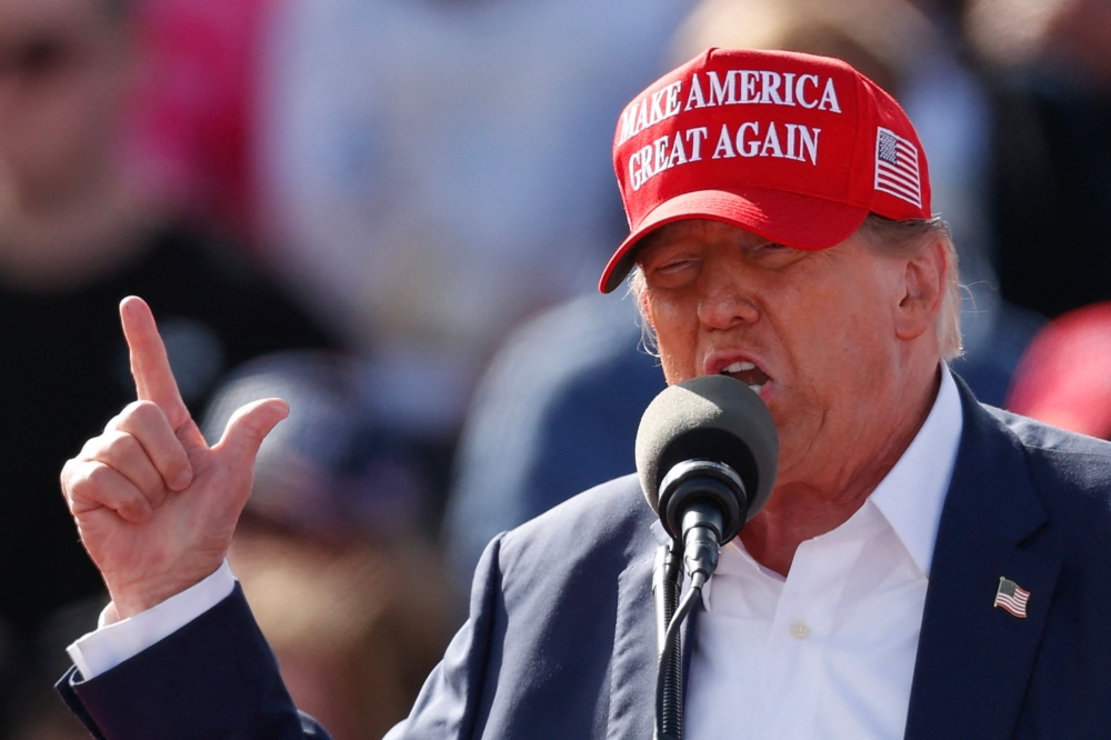 Former US President and Republican presidential candidate Donald Trump speaks during the Buckeye Values PAC Rally in Vandalia, Ohio, on March 16, 2024. (Photo by KAMIL KRZACZYNSKI / AFP)
