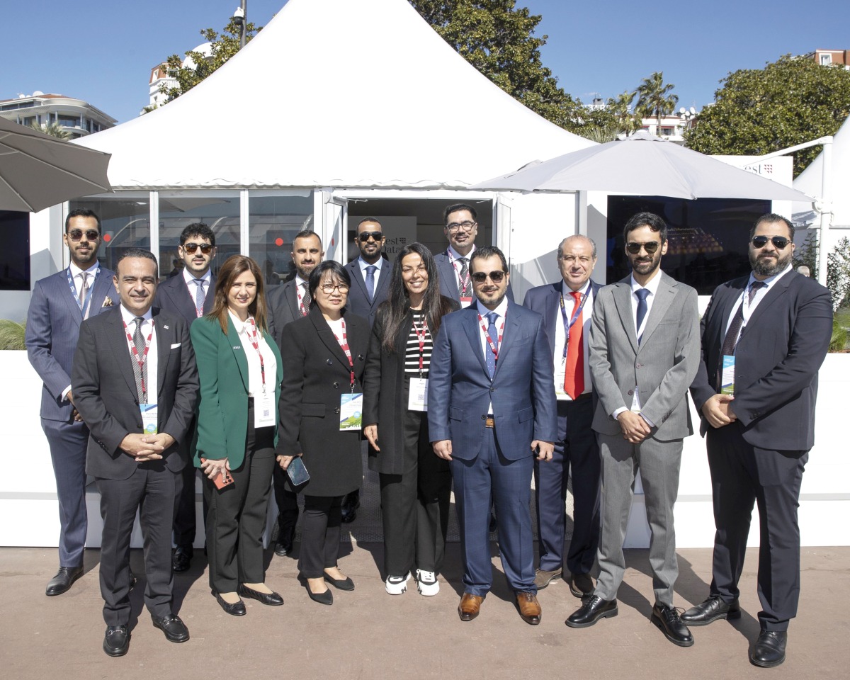 Officials pose for a group photo at MIPIM 2024 in France.