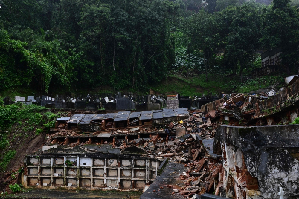 Partial view of the municipal cemetery of Petropolis, where several niches were damaged when they collapsed due to the heavy rains in Petropolis, Brazil on March 2024. (Photo by Pablo PORCIUNCULA / AFP)
