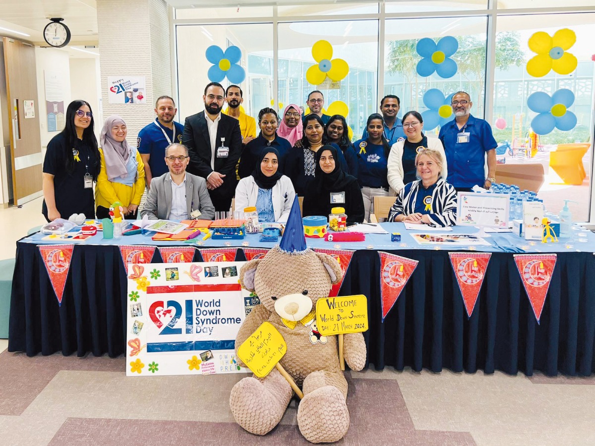 Staff of Al Maha Specialized Pediatric Care Center during the World Down Syndrome Day.