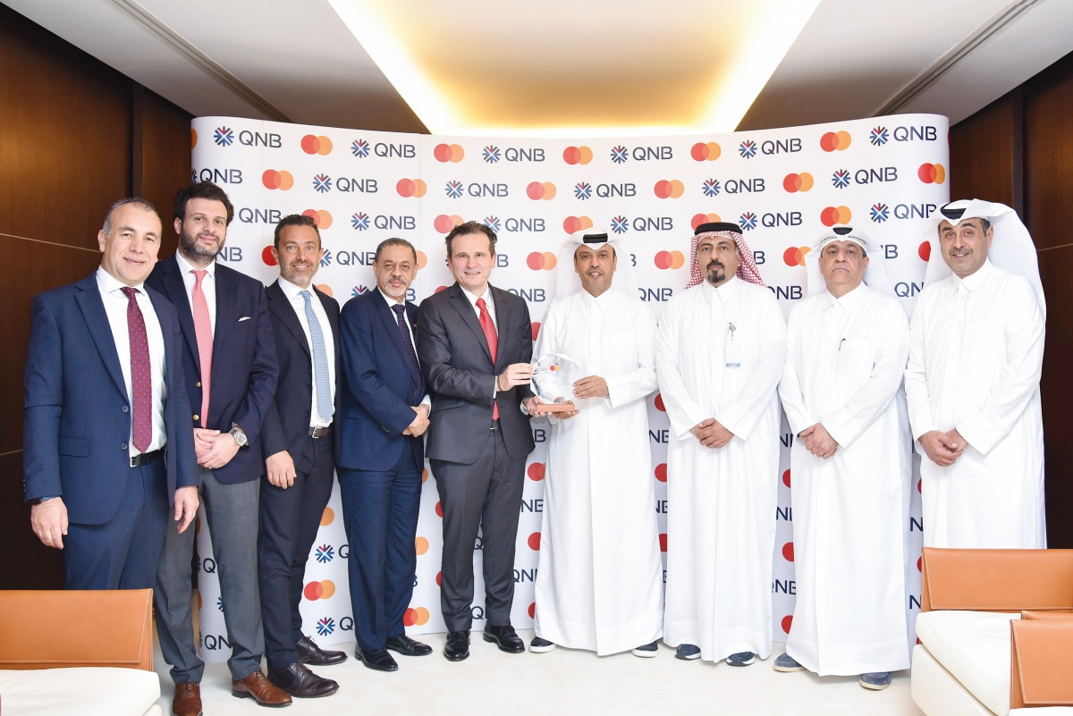 QNB and Mastercard officials during the award ceremony.