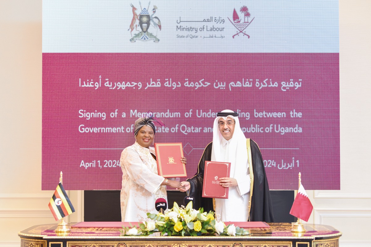 Minister of Labour H E Dr. Ali bin Smaikh Al Marri (right) with Minister of Gender, Labour, and Social Development of Uganda H E Betty Amongi during the event.
