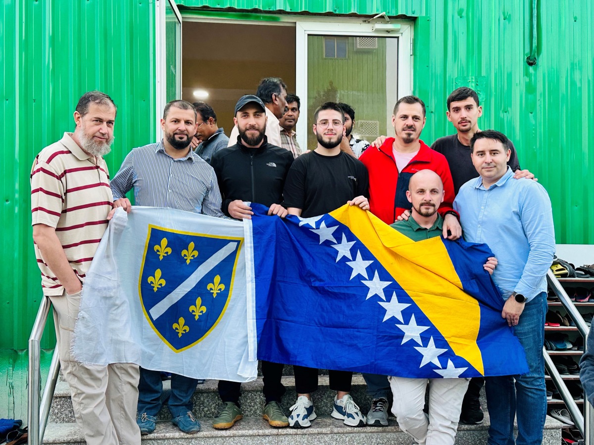 Members of the Bosnian community pose for a picture during an Iftar event.