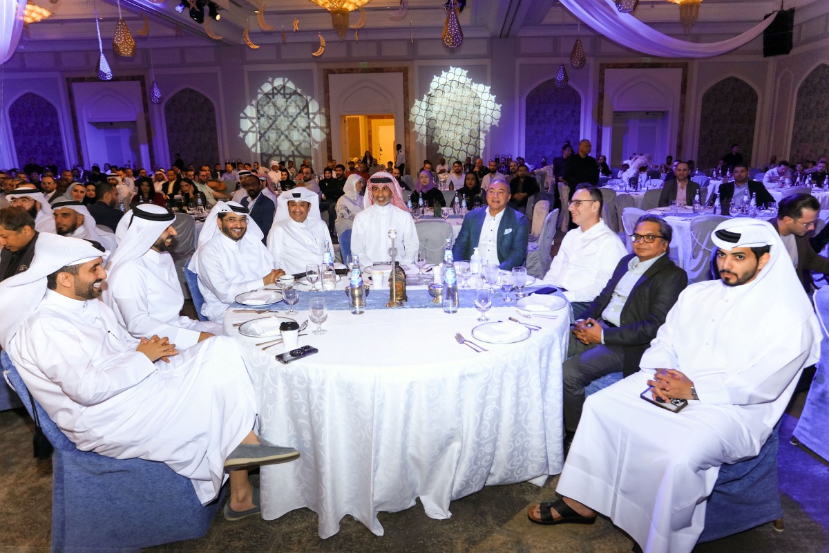 QIB CEO Bassel Gamel with other officials during the annual staff Ramadan Ghabga.