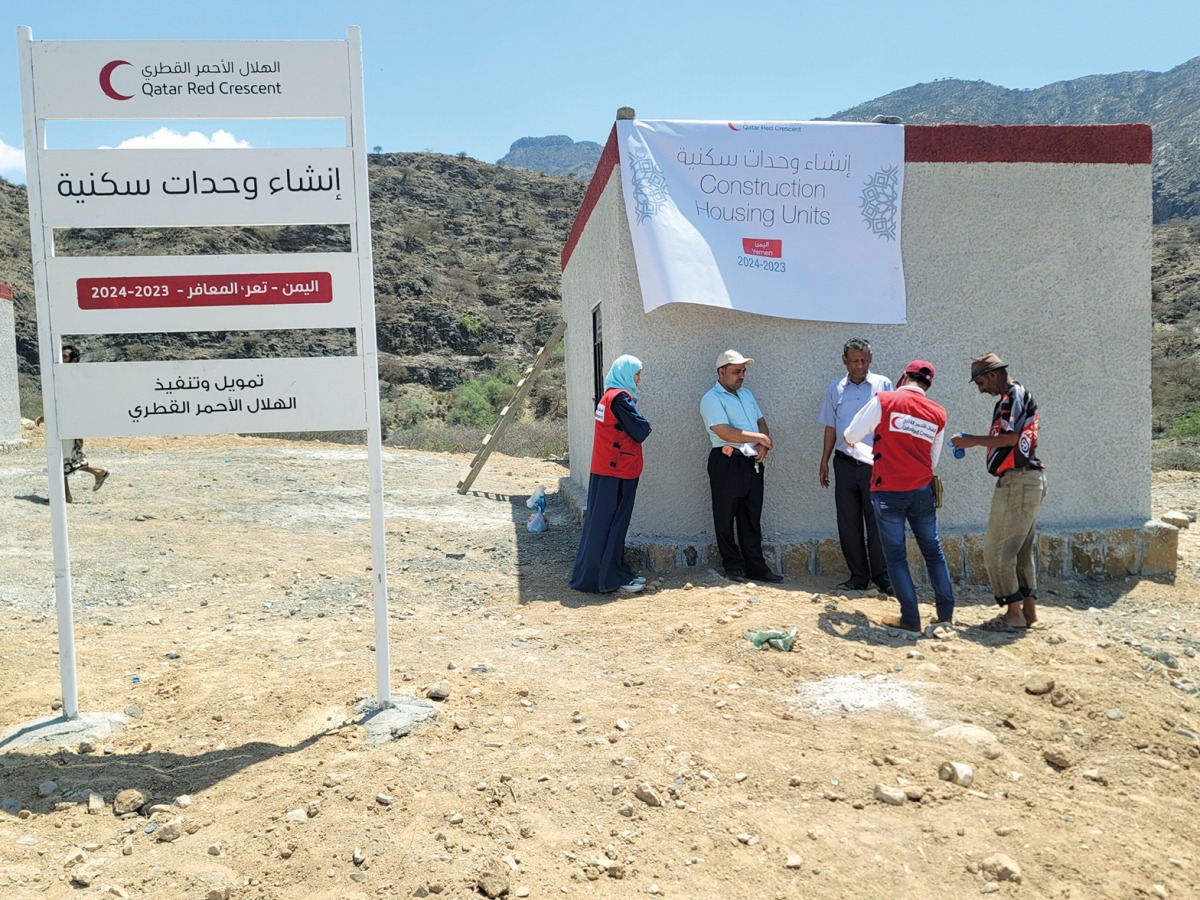 QRCS officials at one of the project sites in Yemen.