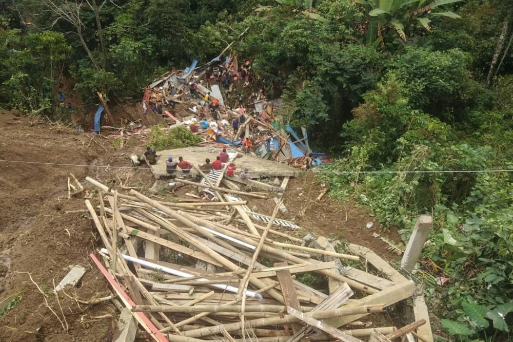 This handout photo released on April 14, 2024 by the National Search and Rescue Agency (BASARNAS) shows a landslide site in Tana Toraja, South Sulawesi. (Photo by Handout / BASARNAS / AFP) 