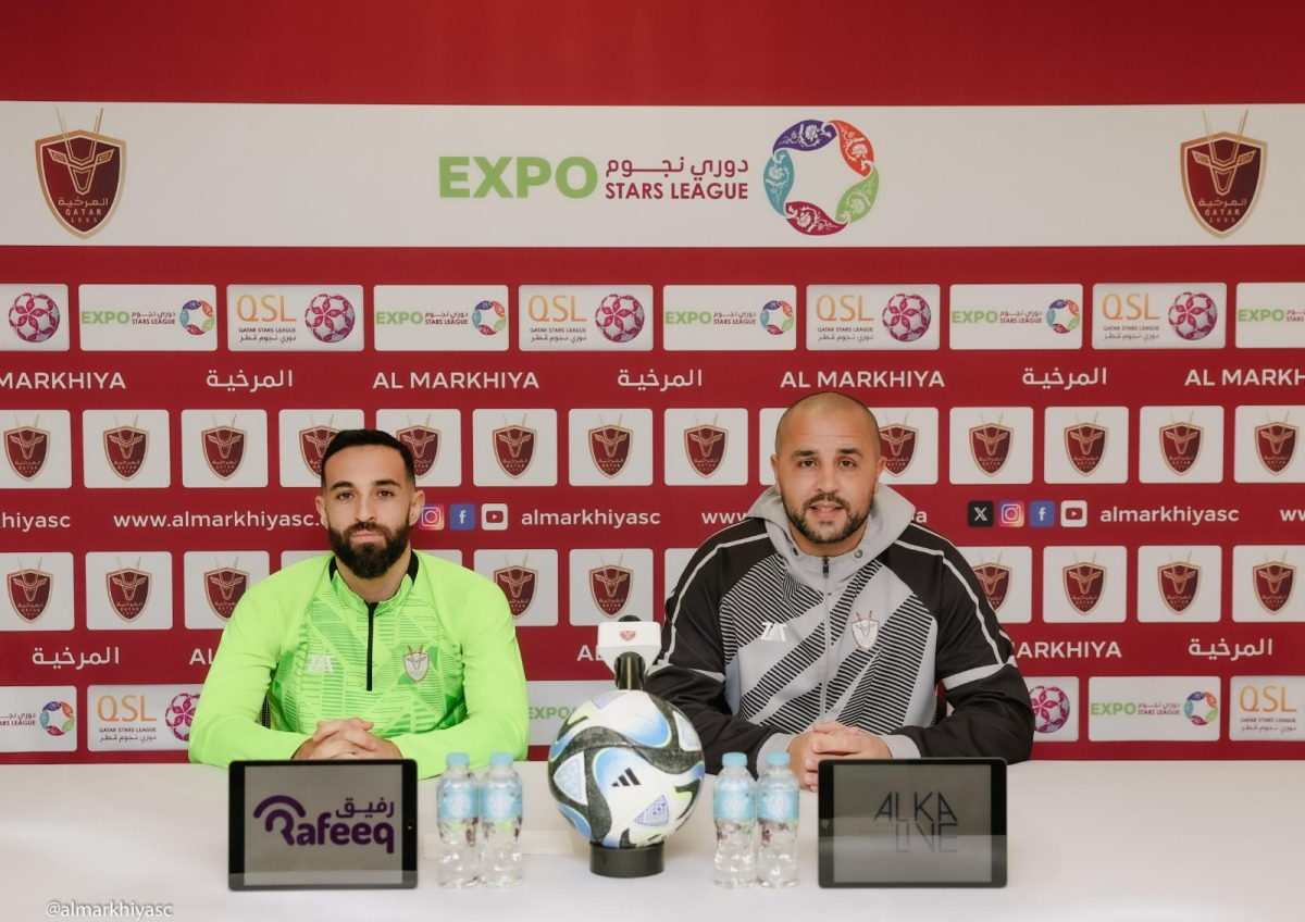 Al Markhiya coach Madjid Bougherra  (right)and player Driss Fettouhi during a press conference ahead of their play-off against Al Shahania.