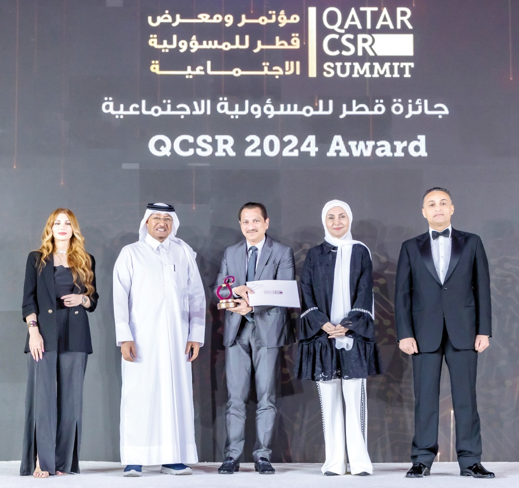 CEO of Qatar CSR National Programme Dr. Saif Ali Al Hajari (second left), Regional Director of LuLu Hypermarket Qatar Shaijan M.O. (centre) with other officials at the awards ceremony.  