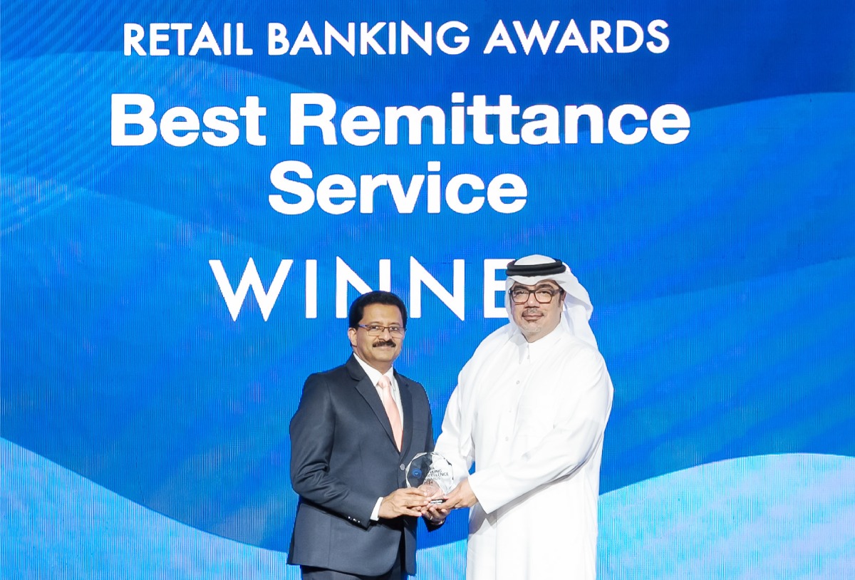 A Commercial Bank official receiving the award.