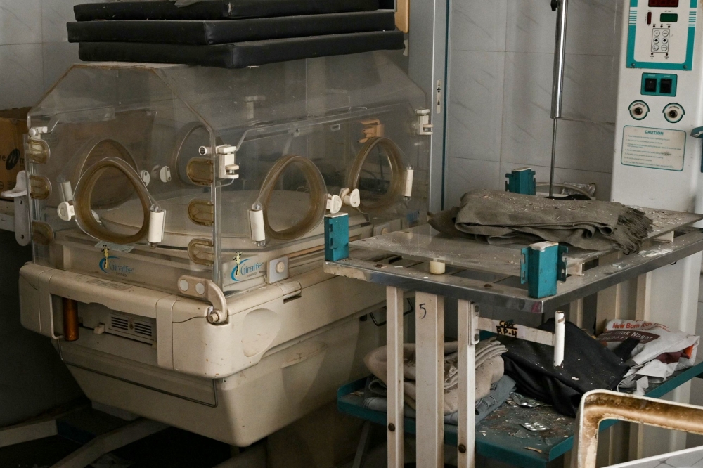 A medical ward of a children's hospital lies in shambles a day after a fire blazed through it in New Delhi on May 26, 2024. Photo by Arun SANKAR / AFP