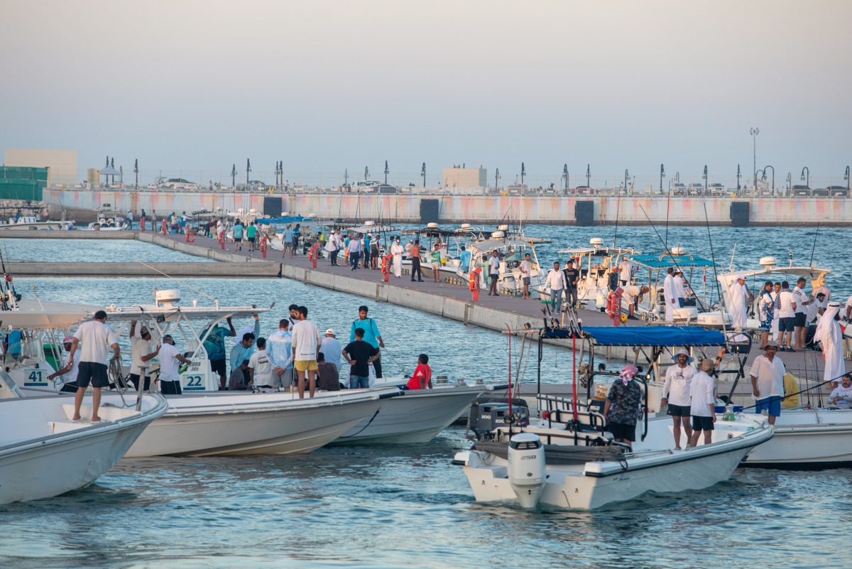 Teams taking part in the fishing competition held at the Old Doha Port.