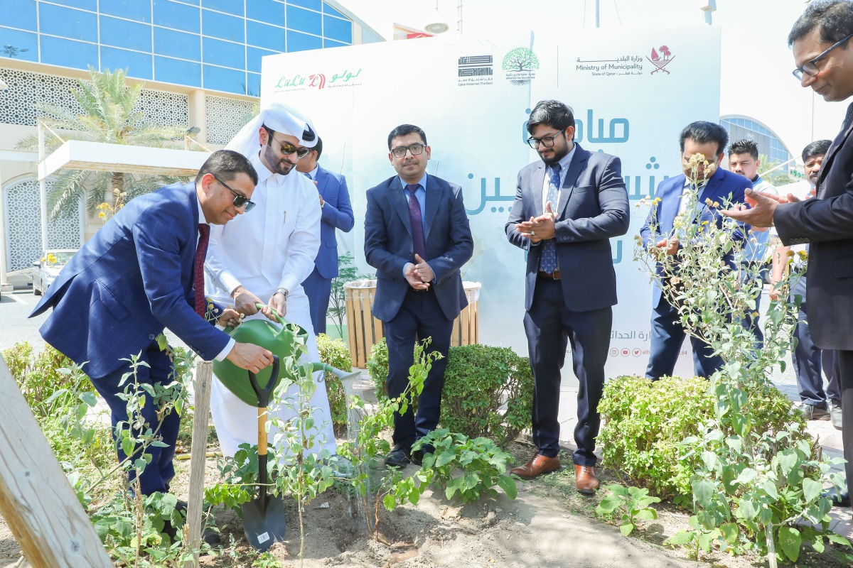 Officials planting a tree to mark World Environment Day at Lulu Hypermarket’s D Ring Road branch.